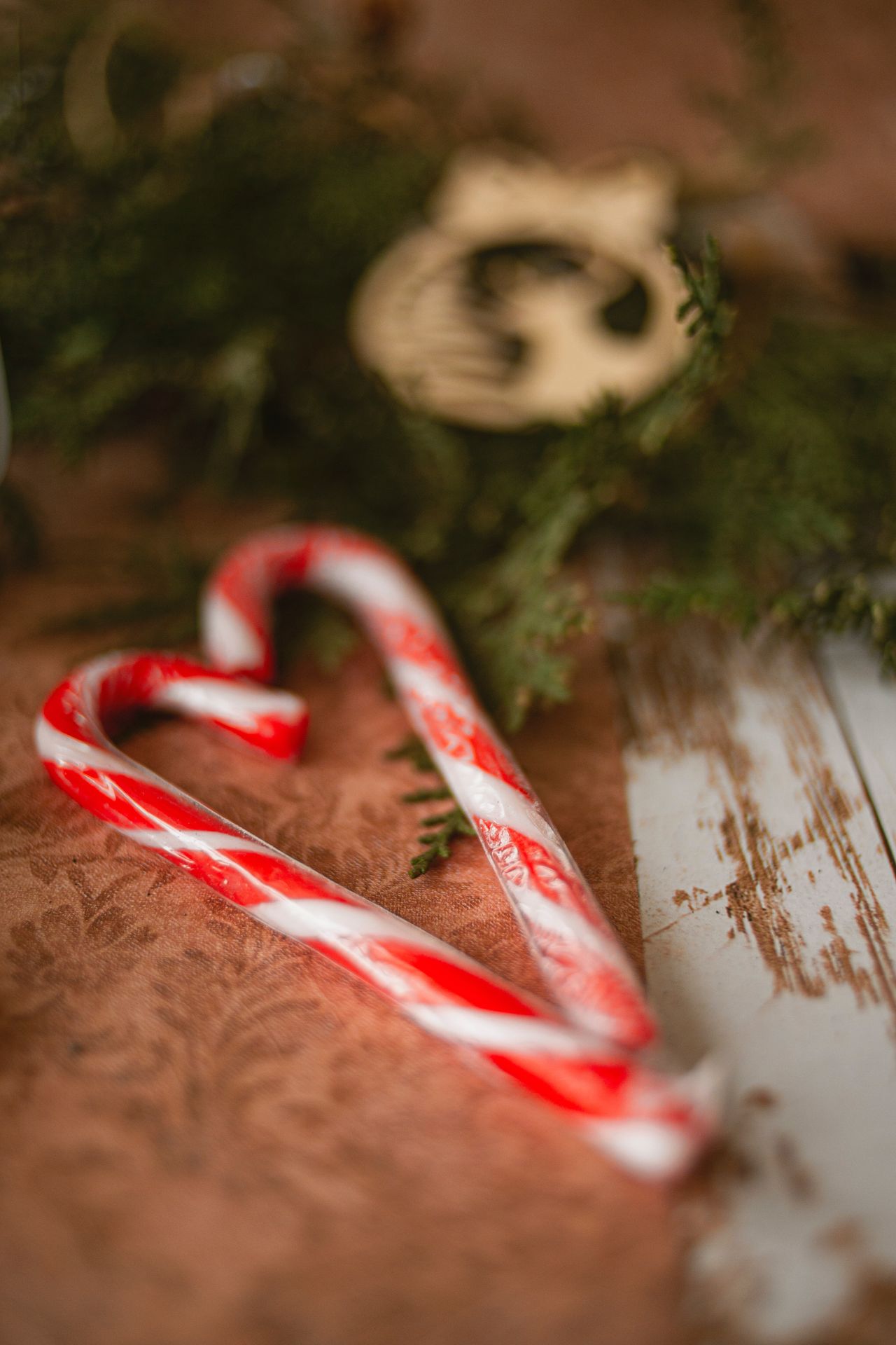 Candy Canes on a wooden table. Candy Canes on a wooden table.
