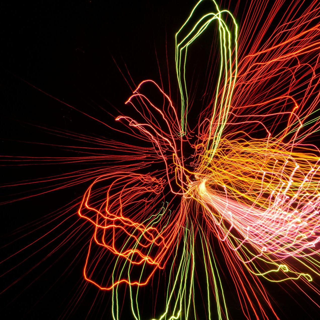 Chronic Health Wisdom: Electromagnetic Field Therapy for Wellness in San Francisco Abstract light trails symbolizing electromagnetic field therapy (PEMF) for chronic pain relief discussed by Chronic Health Wisdom in San Francisco.